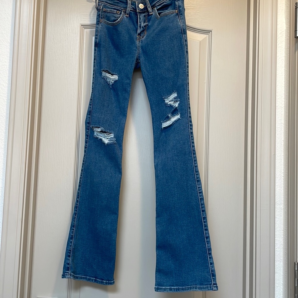 Medium rise boot cut ripped jeans from hollister